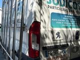 a van that is parked on the side of the road