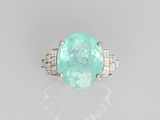 an emerald and diamond ring