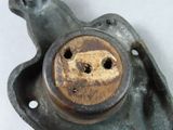 a close up of a metal object with a hole in it