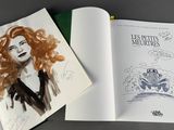 a picture of a book with a drawing of a woman on it