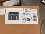 an image of a box with an electronic device on top of it