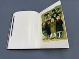 un livre ouvert sur lequel figure l'image d'un groupe d'enfants