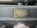 a close up of a motorcycle engine with a plaque on it
