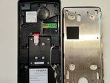 a metal box with a metal latch and a metal cover