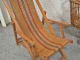 a chair and a basket sitting on a patio