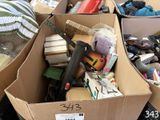 a cardboard box filled with assorted items in a store