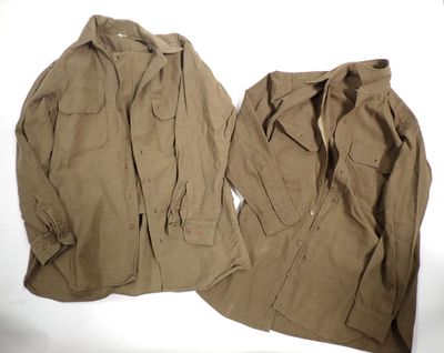 pair of men ' s khaki shirts on a white background