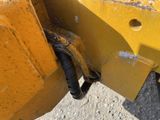 a close up of a piece of machinery that is attached to the back of a bulldozer