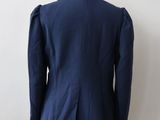 the back view of a blue jacket on a mannequin mannequin mannequin mannequin mannequin mannequin mannequin manne