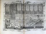 a large open book with a drawing of a large building