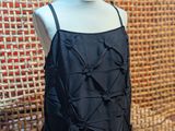 the back of a black dress on a mannequin mannequin mannequin mannequin mannequin mannequin mannequin mannequin