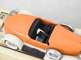 a toy car that is sitting on top of a box