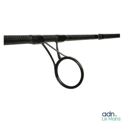 a pair of scissors hanging from the handle of a pole