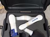 a black case with a blow dryer and other items in it