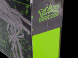 a box of pokemon trading cards on a black background