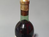 a bottle of wine that is sitting on a table