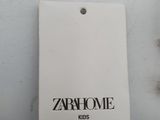 a tag that says zarl home kids on it