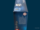 a box of cigarettes sitting on a blue surface
