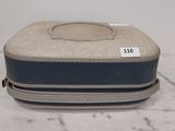 a piece of luggage sitting on a marble table