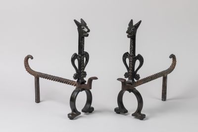 pair of antique cast iron candlesticks in the shape of a horse head