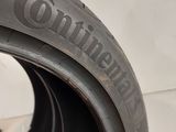 a close up of a tire with the word continental written on it