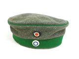 grey cap with green band and red and white circle on the side