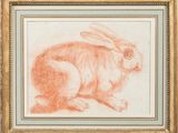 un dessin représentant un lapin dans un cadre doré
