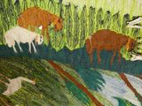 a lot of animals that are walking in the grass