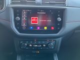 a picture of a car dashboard with a radio in it