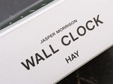 a box of wall clock sitting on the ground