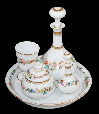 a picture of a set of porcelain objects on a plate