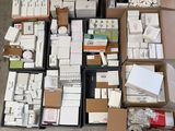 many boxes and boxes of electronic equipment on the floor