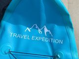 a close up of a blue surfboard with a logo on it