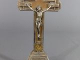 silver metal crucifix with jesus on the cross on top of it