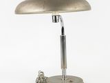 an image of a desk lamp with a metal base and a metal handle