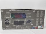 a box with a keyboard and headphones inside of it