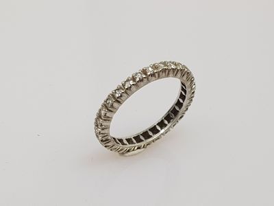 a close up of a ring on a white surface