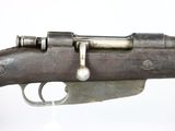 an old gun that is sitting on top of a table