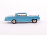 a toy car that is sitting on a white surface