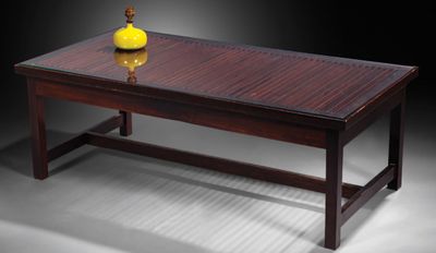 Joaquim TENREIRO (1906-1992) Table basse en bois teinté à pl…