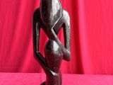 an image of a statue of a man holding a woman ' s hand