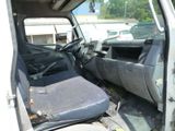 an image of a van with the door open and the seat up