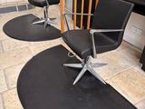 three chairs that are sitting on the floor in the room