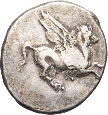 a close up of a silver coin with a horse on it