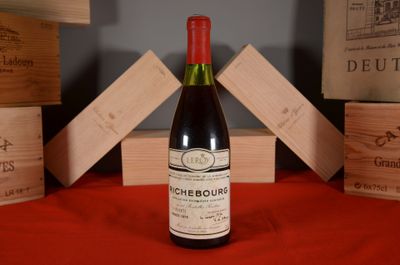 a bottle of wine that is sitting on a table