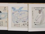 three framed chinese paintings of horses and birds on a black background