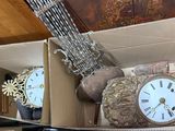 a box with a clock inside of it on a table