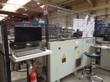 an image of a factory with a computer and a fire extinguisor