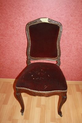 a chair that is sitting on a hard wood floor