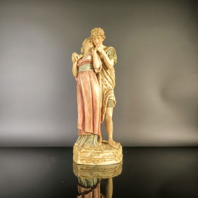 an image of a statue of a woman holding a child
